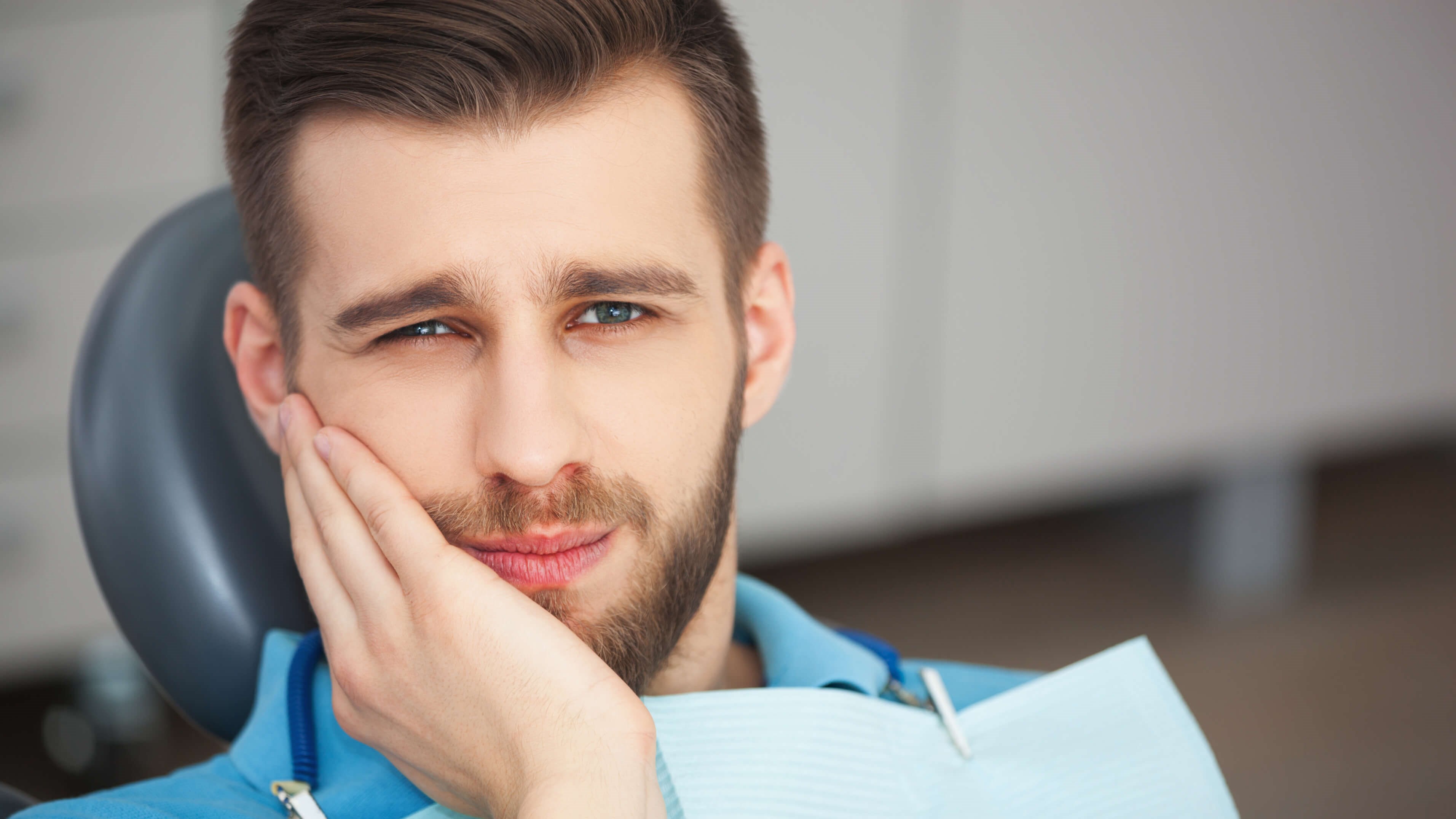 man with tooth sensitivity